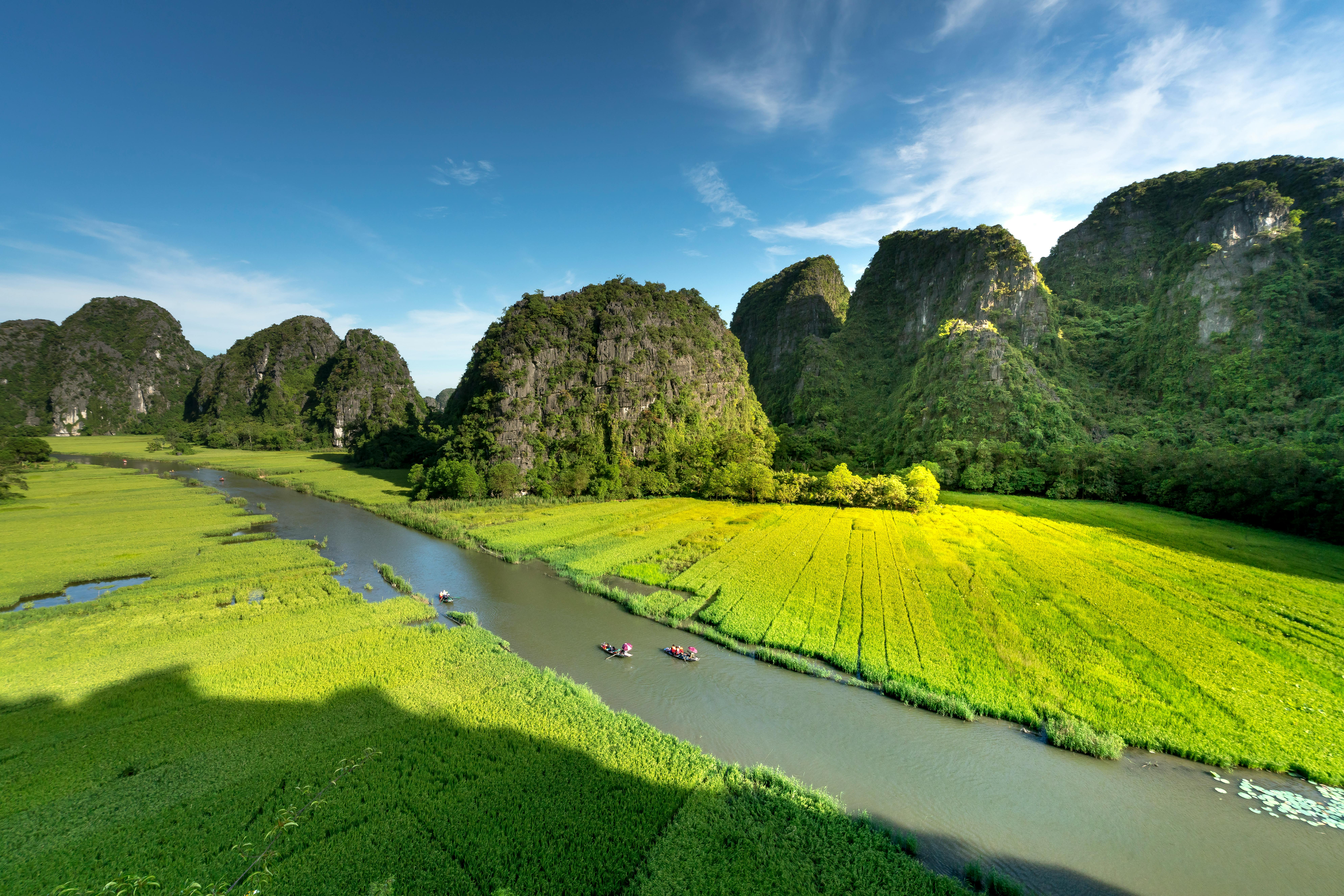 Boat Through Limestone Valleys