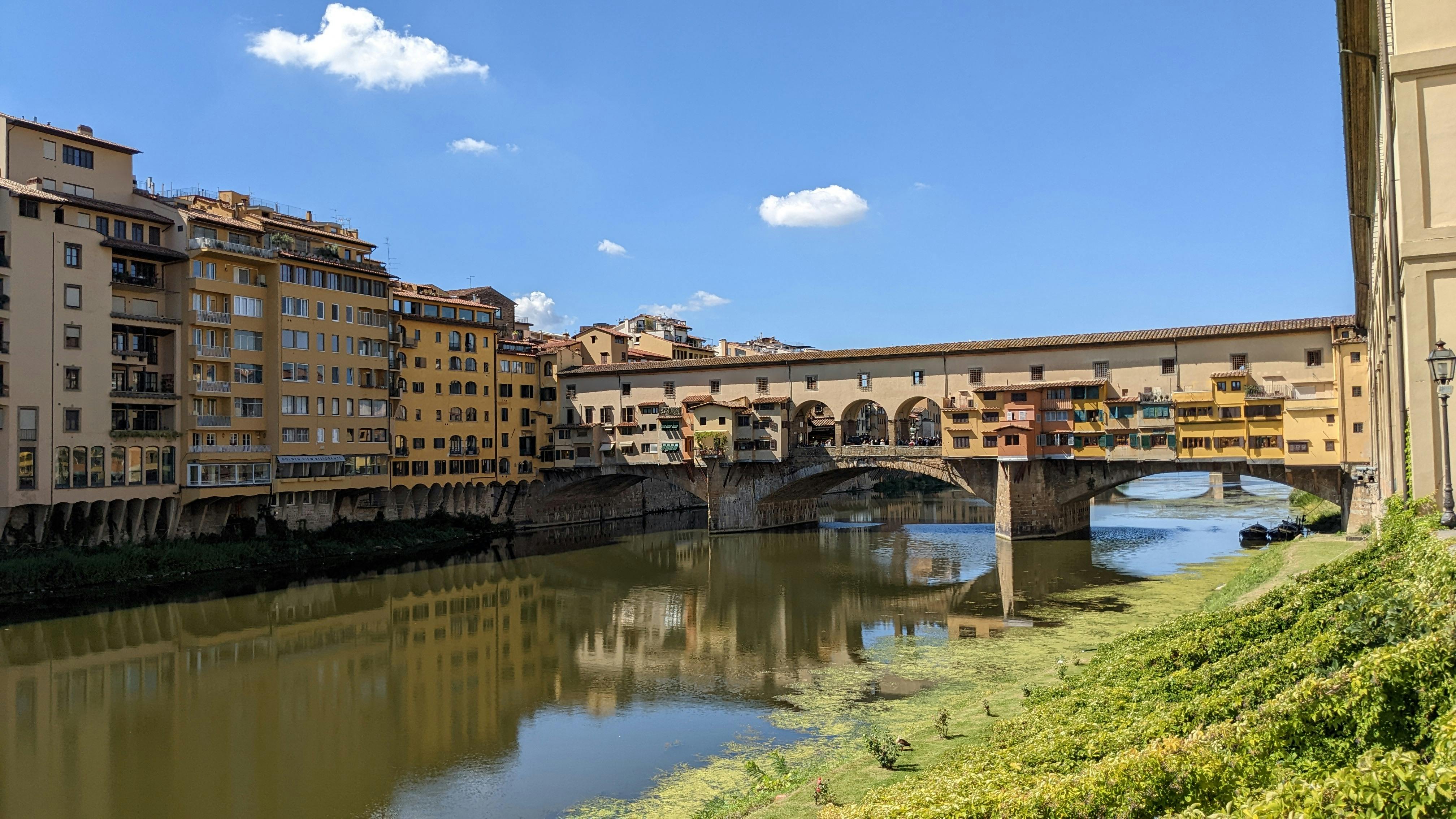 Crossing the Ponte Vecchio at Dusk